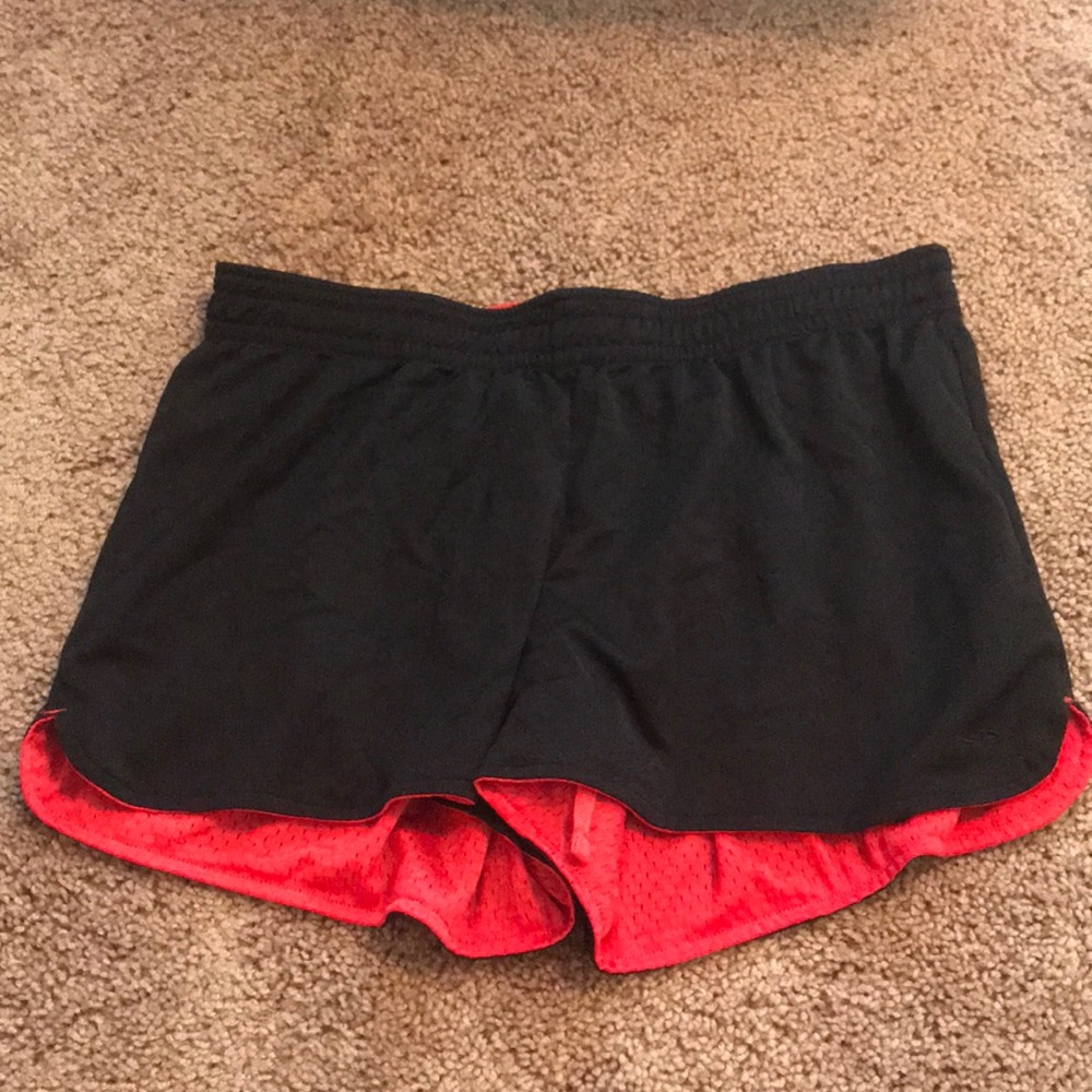 Reversible black and orange athletic shorts